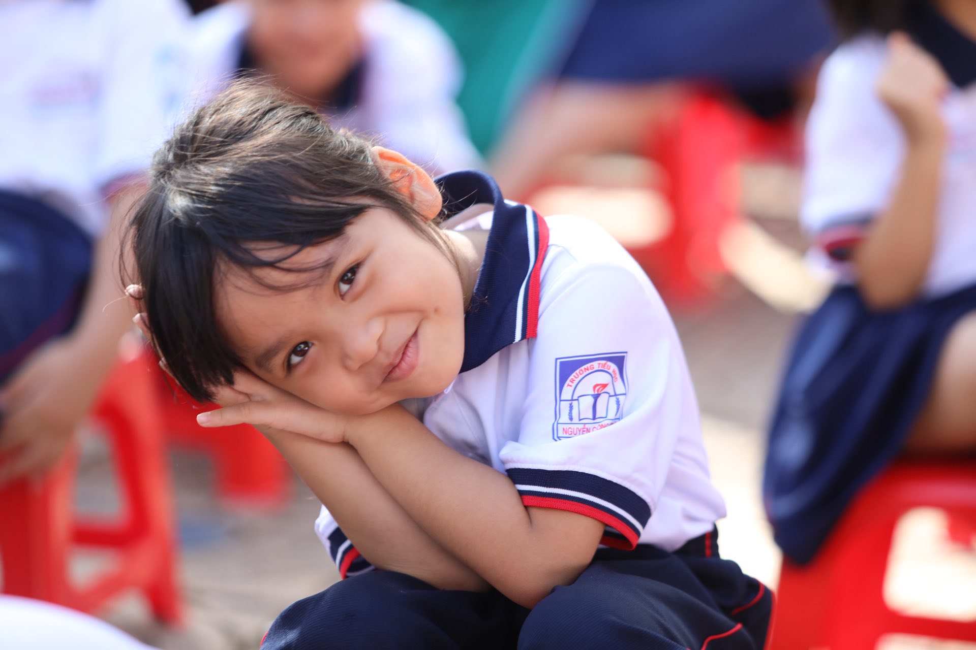 Nụ cười hạnh phúc của em học sinh trường Nguyễn Công Trứ trong buổi chuyên đề.